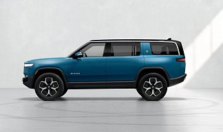 Rivian R1S синего цвета 2023 года на 22 колёсах фото 2