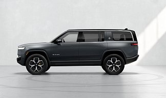 Rivian R1S серого цвета 2023 года на 22 колёсах фото 2