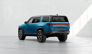 Rivian R1S синего цвета 2023 года на 22 колёсах фото 3