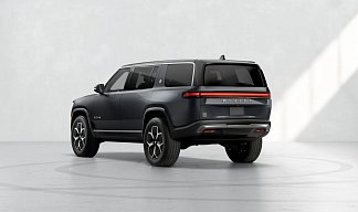 Rivian R1S серого цвета 2023 года на 22 колёсах фото 3