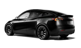 Tesla Model Y Performance черного цвета 2025 года на 21 колёсах фото 3