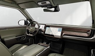 Rivian R1S серого цвета 2023 года на 22 колёсах фото 5