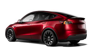 Tesla Model Y Performance красного цвета 2025 года на 21 колёсах фото 3