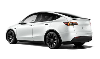 Tesla Model Y Performance белого цвета 2025 года на 21 колёсах фото 3