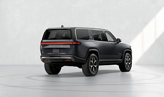 Rivian R1S серого цвета 2023 года на 22 колёсах фото 4