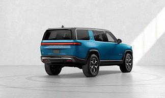 Rivian R1S синего цвета 2023 года на 22 колёсах фото 4