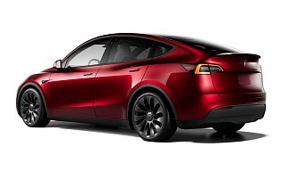 Tesla Model Y Performance красного цвета 2025 года на 21 колёсах фото 3
