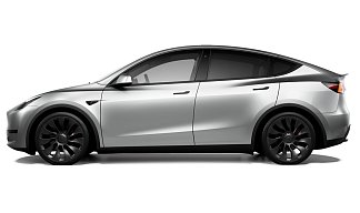 Tesla Model Y Performance серебристого цвета 2025 года на 21 колёсах фото 2