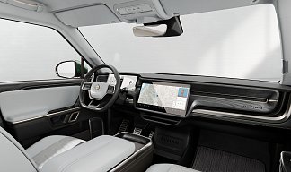 Rivian R1S зеленого цвета 2023 года на 22 колёсах фото 5